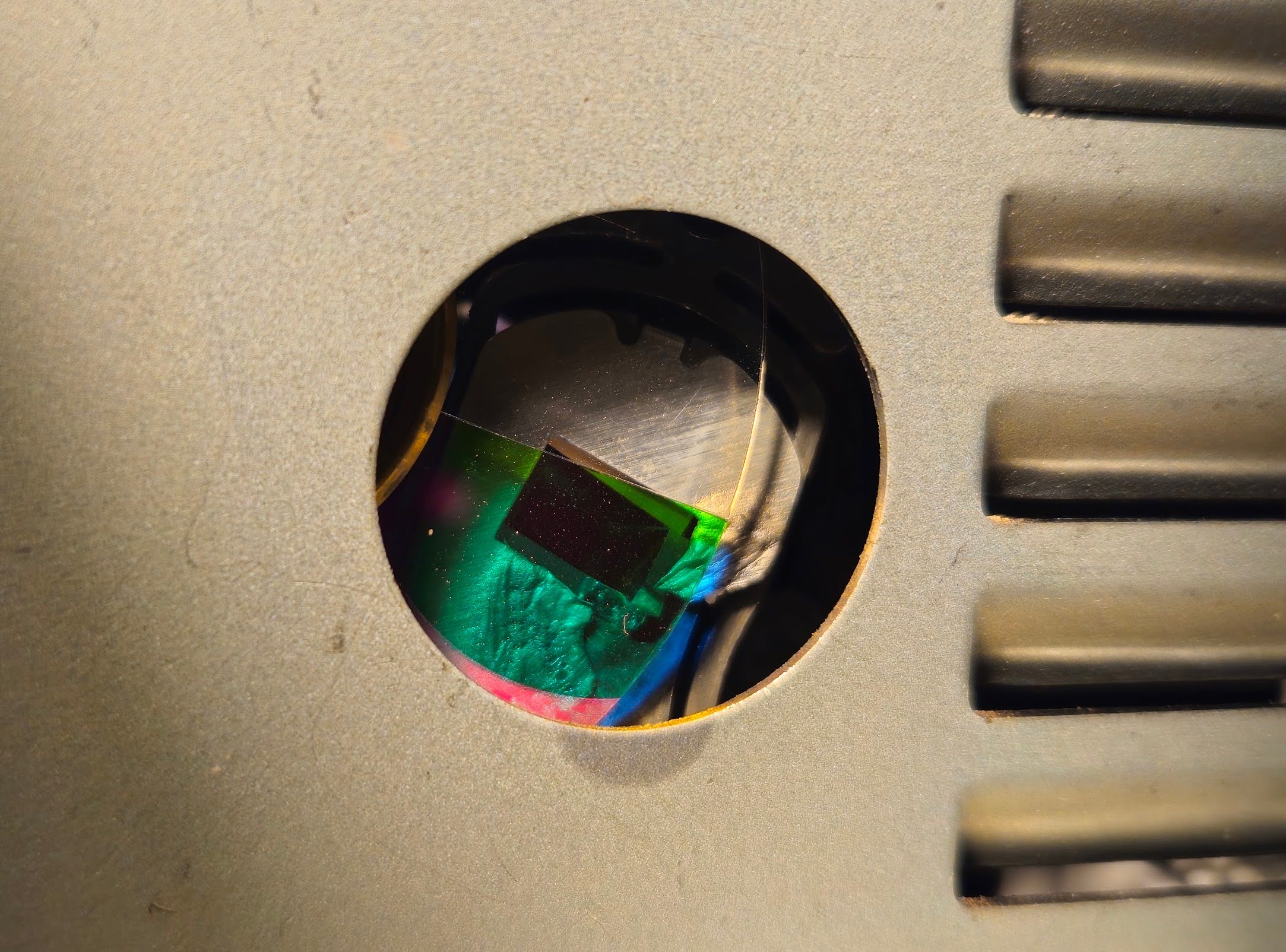 Molten light tunnel cover as seen with the lamp cartridge removed